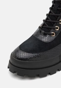 MICHAEL Michael Kors Rowan- Enkellaarsjes Met Plateauzool - Black 13 MICHAEL Michael Kors Rowan- Enkellaarsjes Met Plateauzool - Black -Mode Schoenen 74e44b5604424367aacda4342f73614e